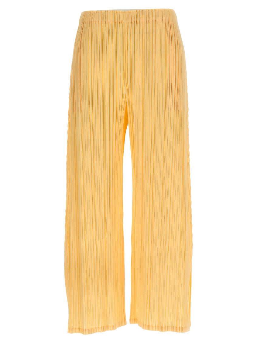Yellow 'Mellow Pleats' pants 1