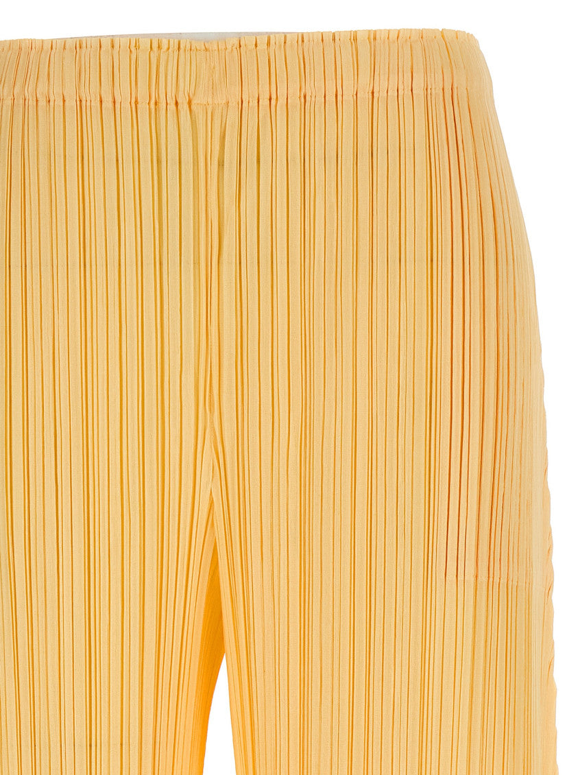 Yellow 'Mellow Pleats' pants 3