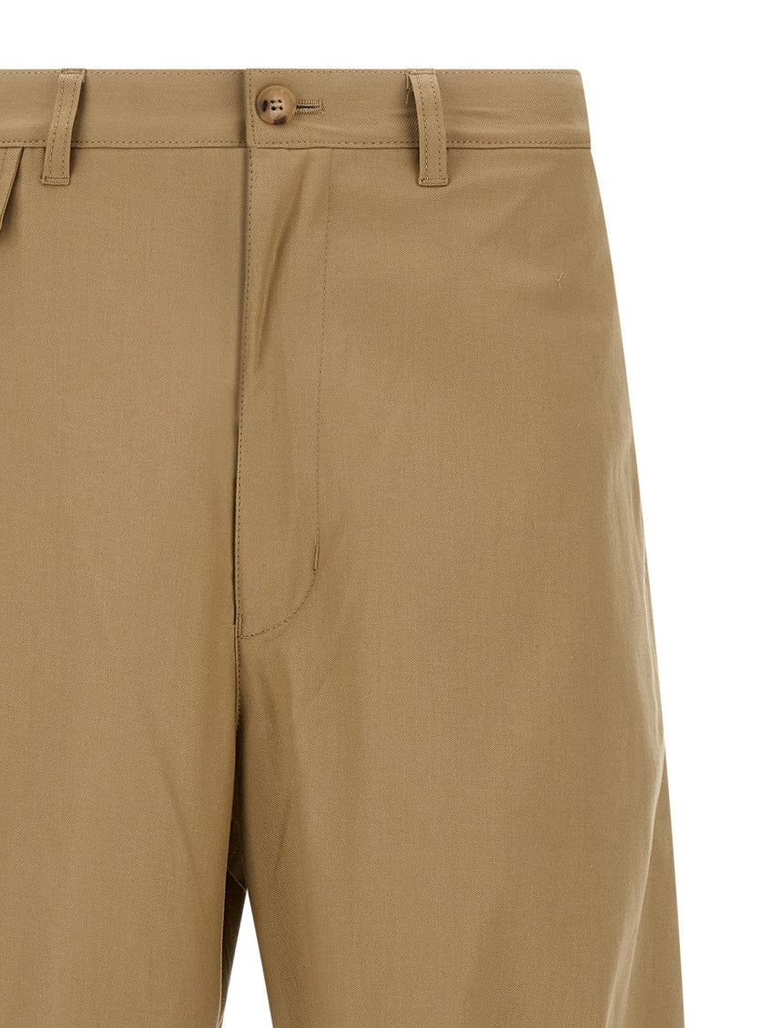 Beige Curved leg pants 3