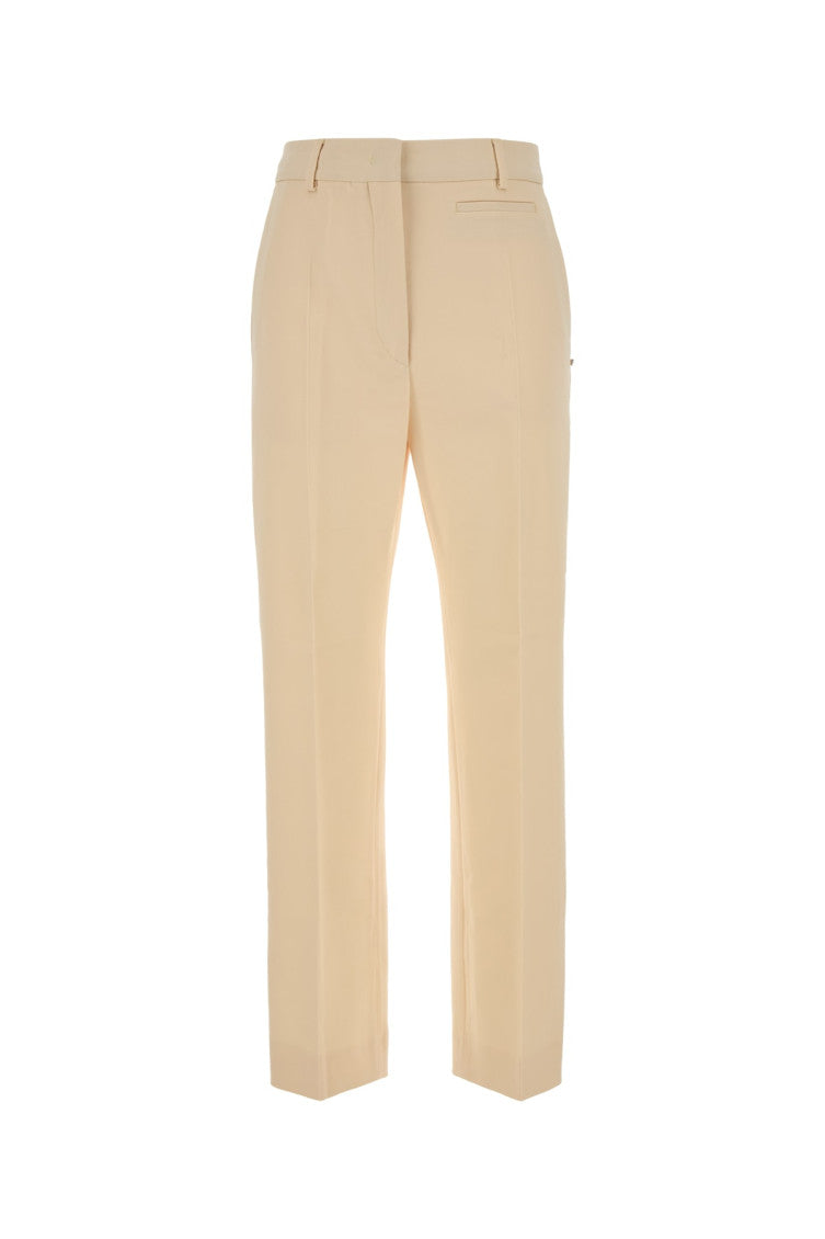 Beige pressed-crease trousers 1