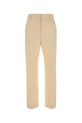 Beige pressed-crease trousers 1